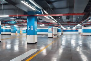 underground parking lots batten light This image showcases the application of an LED linear light fixture in an underground parking lot. Equipped with emergency function and sensor dimming capabilities, this LED lighting fixture provides round-the-clock illumination. It offers bright, spacious lighting, ensuring safety and energy efficiency.